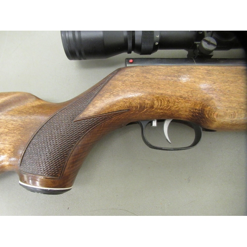 84 - A Weihrauch HW77 .22 air rifle with attached Hawke 3-9x50 scope, Armson OEG sight and soft case