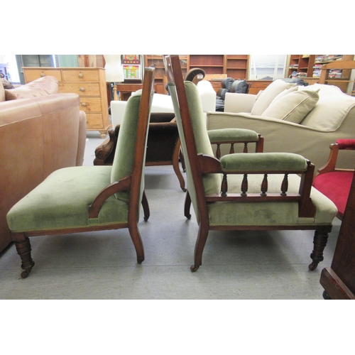 88 - A late Victorian mahogany framed gentleman's arm chair, upholstered in braided sage green dralon wit... 