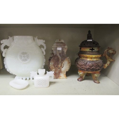 90 - Chinese hardstone collectables: to include a vase and cover of pierced bulbous form  9.5