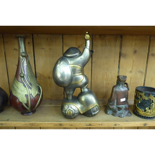 95 - Oriental metal collectables: to include a Japanese bronze vase, decorated with organic designs  12