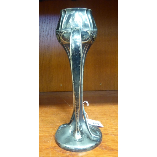 252 - An Art Nouveau period English pewter twin handled, freeform, pedestal vase   stamped 029  11