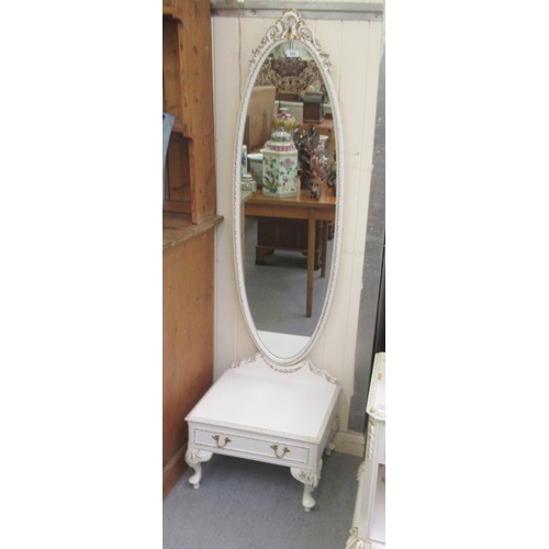 244 - A modern white painted and gilded dressing mirror, on a box drawer base, on stubby cabriole legs  64... 