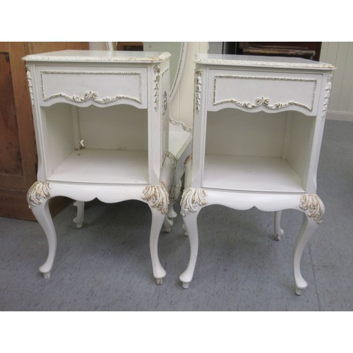 244 - A modern white painted and gilded dressing mirror, on a box drawer base, on stubby cabriole legs  64... 