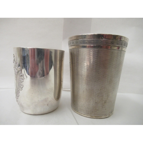 104 - Two late 19thC Continental silver beakers, each bearing an impressed mark&nbsp;