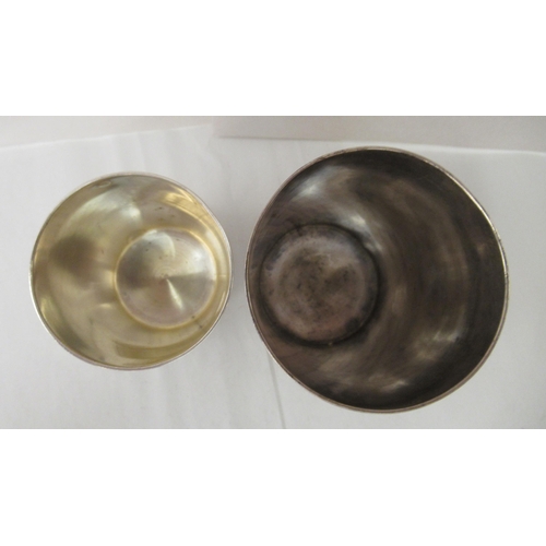 104 - Two late 19thC Continental silver beakers, each bearing an impressed mark&nbsp;