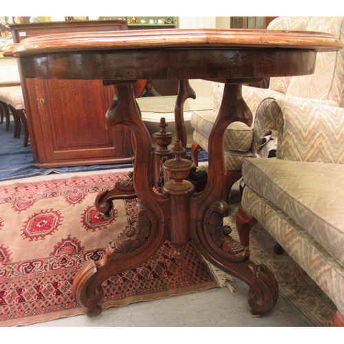 109 - A late Victorian crossbanded mahogany centre table, the top with a moulded breakfront edge, raised o... 