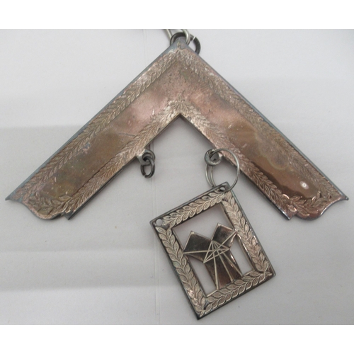 110 - Masonic related collectables: to include a 9ct gold pin; ephemera and badges&nbsp;