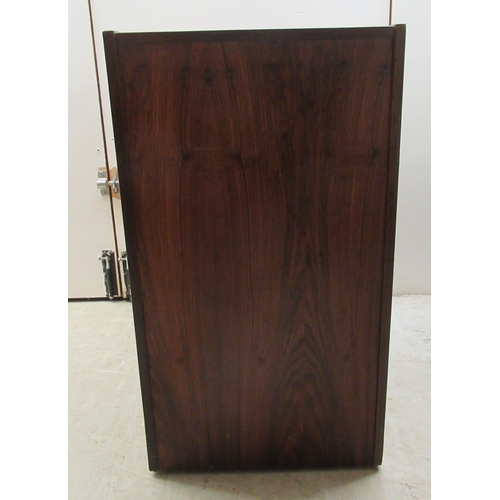 181 - A mid 20thC Scandinavian rosewood finished filing cabinet, the lockable vertically sliding tambour f... 
