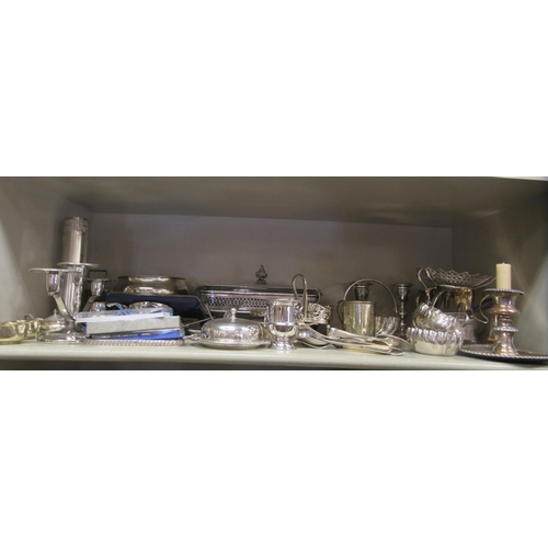 184 - Silver plated and other metal tableware: to include a four division wire toastrack; and a glass entr... 