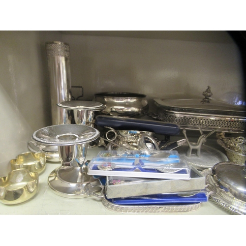 184 - Silver plated and other metal tableware: to include a four division wire toastrack; and a glass entr... 