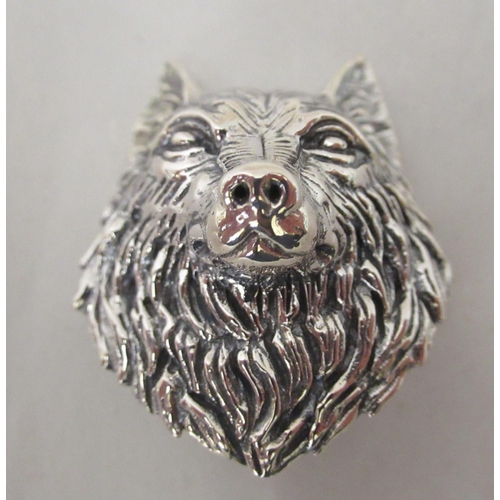 187 - A Sterling silver dog's head mask style brooch