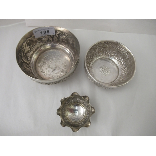 188 - Asian silver coloured/white metal wares, viz. two decoratively embossed cast and chased bowls&nbsp; ... 