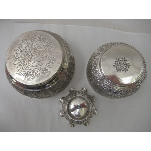 188 - Asian silver coloured/white metal wares, viz. two decoratively embossed cast and chased bowls&nbsp; ... 