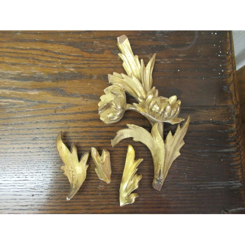 190 - A late 18th/early 19thC mirror, set in a carved giltwood, foliate scrolled and floral, rococo style ... 