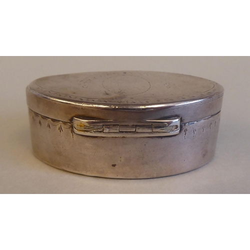 198 - A George IV silver lozenge shape patch box with scratch engraved decoration on the hinged lid  Londo... 