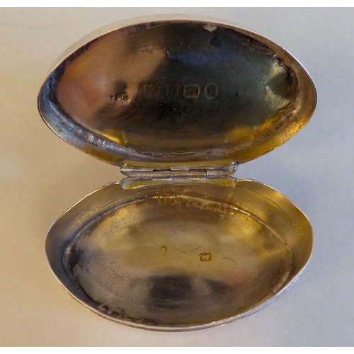 198 - A George IV silver lozenge shape patch box with scratch engraved decoration on the hinged lid  Londo... 