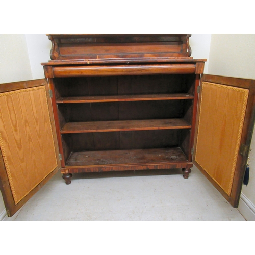 200 - A Regency goncalo alves chiffoniere with bead carved borders, the shelved upper part over a pair of ... 