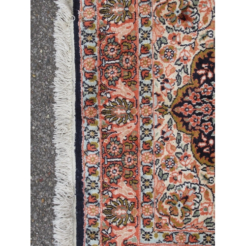 209 - A Kelim part silk prayer rug, decorated with floral designs, on a multi-coloured ground with a dark ... 