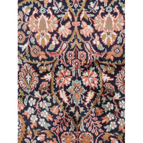 209 - A Kelim part silk prayer rug, decorated with floral designs, on a multi-coloured ground with a dark ... 