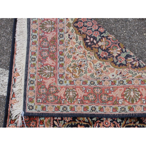 209 - A Kelim part silk prayer rug, decorated with floral designs, on a multi-coloured ground with a dark ... 