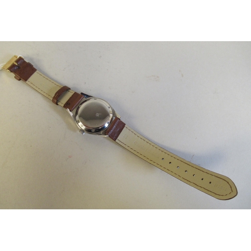 21 - A Girard-Perregaux Giromatic stainless steel cased wristwatch, the automatic movement with sweeping ... 