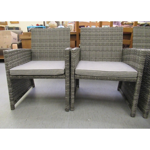214 - A four piece grey coloured rattan terrace furniture set  comprising a two person settee, two arm cha... 