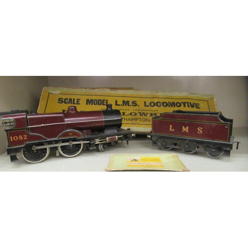 218 - A Bassett-Lowke scale clockwork model 0 gauge 4-4-6 locomotive and tender, in maroon LMS livery  box... 