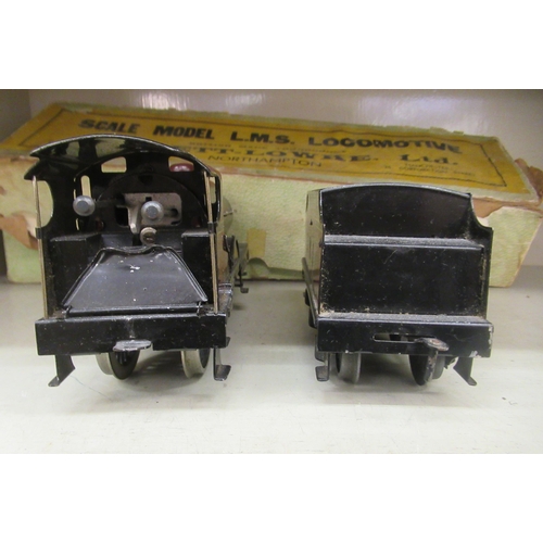 218 - A Bassett-Lowke scale clockwork model 0 gauge 4-4-6 locomotive and tender, in maroon LMS livery  box... 