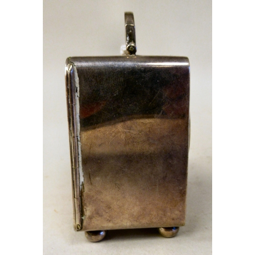 223 - An Asprey & Co traveller's miniature timepiece, the silver case of rectangular box design with a... 