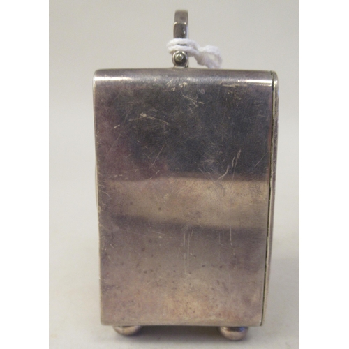 223 - An Asprey & Co traveller's miniature timepiece, the silver case of rectangular box design with a... 