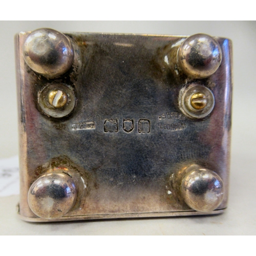 223 - An Asprey & Co traveller's miniature timepiece, the silver case of rectangular box design with a... 