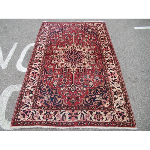 235 - A Soumak rug, decorated with repeating stylised foliate designs, on a multi-coloured ground  62