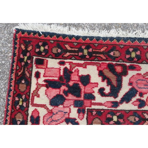 235 - A Soumak rug, decorated with repeating stylised foliate designs, on a multi-coloured ground  62