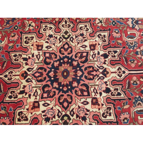 235 - A Soumak rug, decorated with repeating stylised foliate designs, on a multi-coloured ground  62