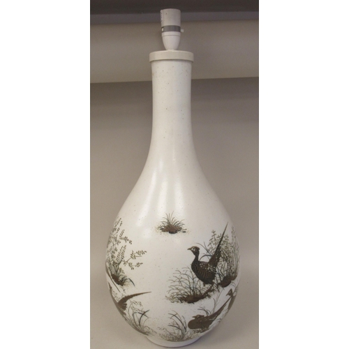 236 - A Royal Copenhagen porcelain aluminia faience table lamp of bulbous bottle vase design, decorated by... 