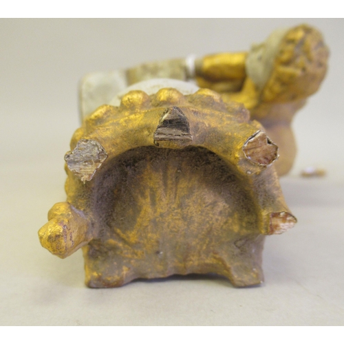 238 - A 17th/18thC carved limewood religious flatback niche figure, the Virgin Mary and Baby Jesus, decora... 