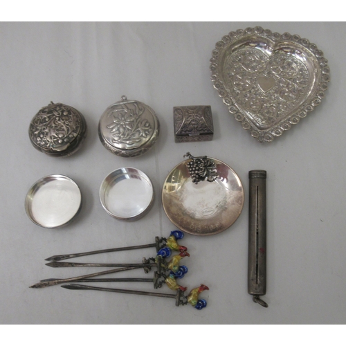73 - Silver and white metal collectables: to include a set of five silver cocktail sticks, surmounted by ... 