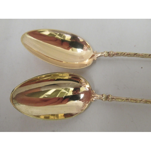 74 - A set of twelve early 20thC French silver gilt teaspoons with decoratively cast handles&nbsp;