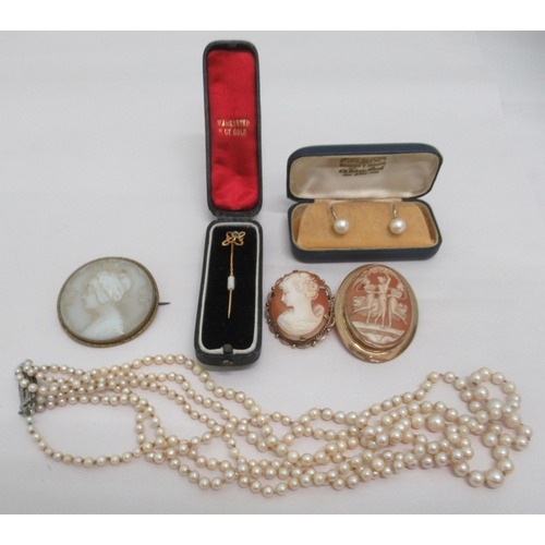 81 - Items of personal ornament: to include a 9ct gold framed cameo brooch; and a triple strand pearl nec... 