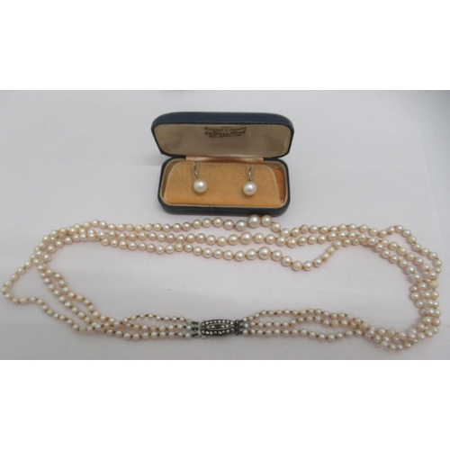 81 - Items of personal ornament: to include a 9ct gold framed cameo brooch; and a triple strand pearl nec... 