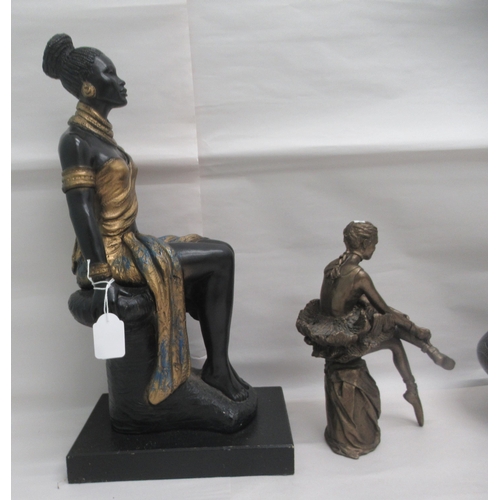 84 - Interior designer accessories: to include a painted plaster figure, a seated African woman, on a pli... 
