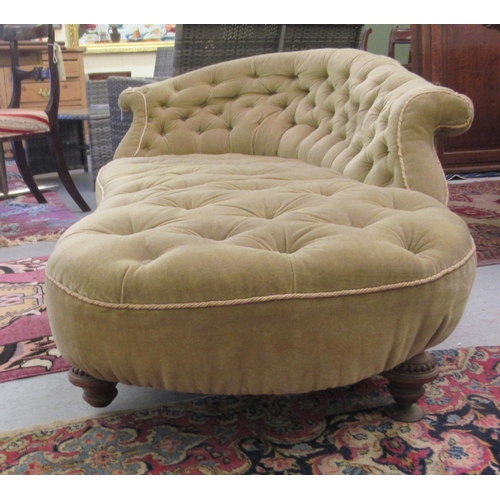 93 - An Edwardian chaise longue, later upholstered in green fabric, raised on turned feet