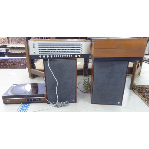 216 - Stereo equipment, viz. a Bush Arena 3 waveband radio; an Alwa Creators stereo; a Garrard automatic t... 