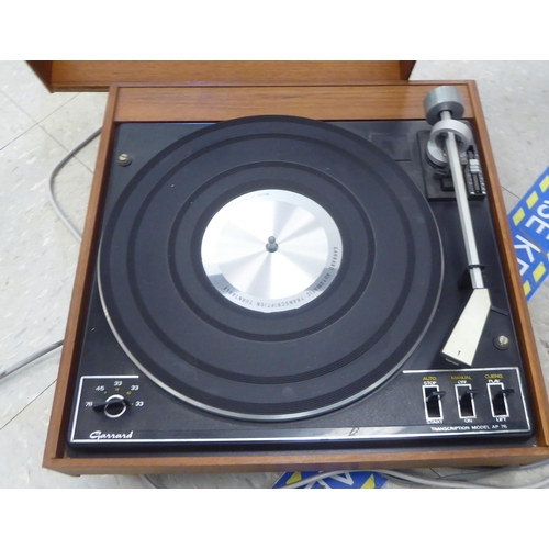 216 - Stereo equipment, viz. a Bush Arena 3 waveband radio; an Alwa Creators stereo; a Garrard automatic t... 