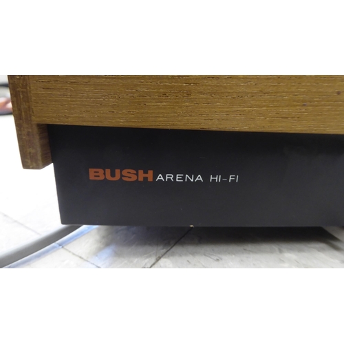 216 - Stereo equipment, viz. a Bush Arena 3 waveband radio; an Alwa Creators stereo; a Garrard automatic t... 