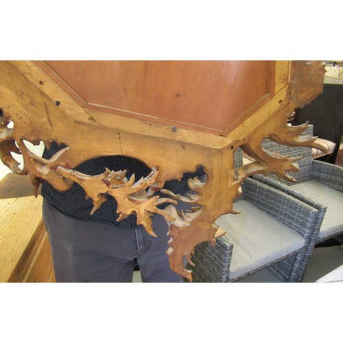 190 - A late 18th/early 19thC mirror, set in a carved giltwood, foliate scrolled and floral, rococo style ... 