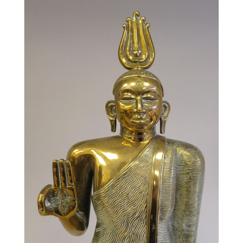 123 - A cast brass religious figure&nbsp; 15