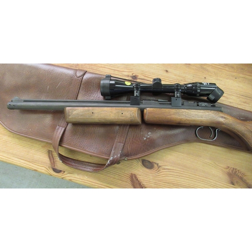 111 - An American Benjamin 1.77 calibre air rifle with sight