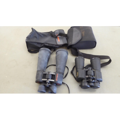 112 - A pair of SkyMaster 15x70 binoculars; and another pair of Nikon Action-ex 10x50 example