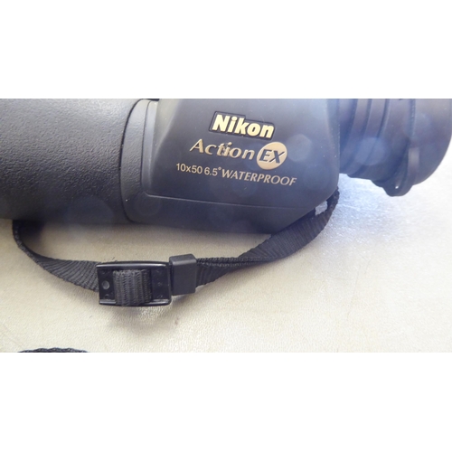 112 - A pair of SkyMaster 15x70 binoculars; and another pair of Nikon Action-ex 10x50 example